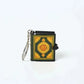 Mini Koran keychain met groen en gouden decoratieve omslagontwerp